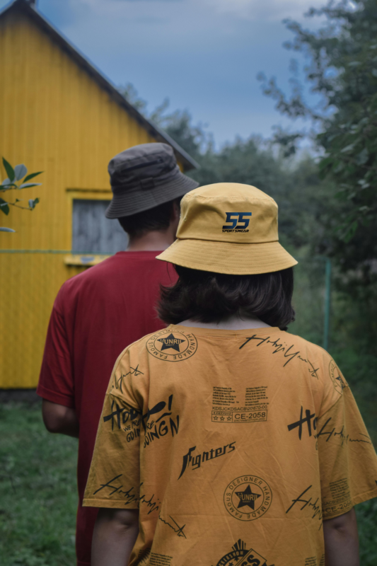 Custom printed apparel and embroidered hat by 55 Sportswear